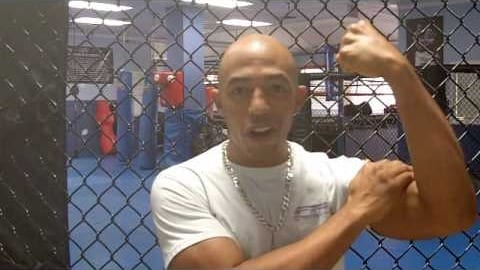 Yoshi Dade speaking to camera at Freestyle Fighting Academy